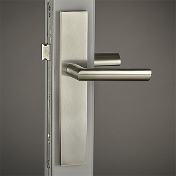 Brass Atlas Lever with City Backplate in Satin Nickel