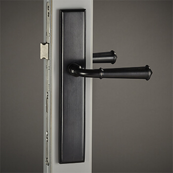 Brass Colonial Lever with Rectangular Backplate in Dark Oil-Rubbed