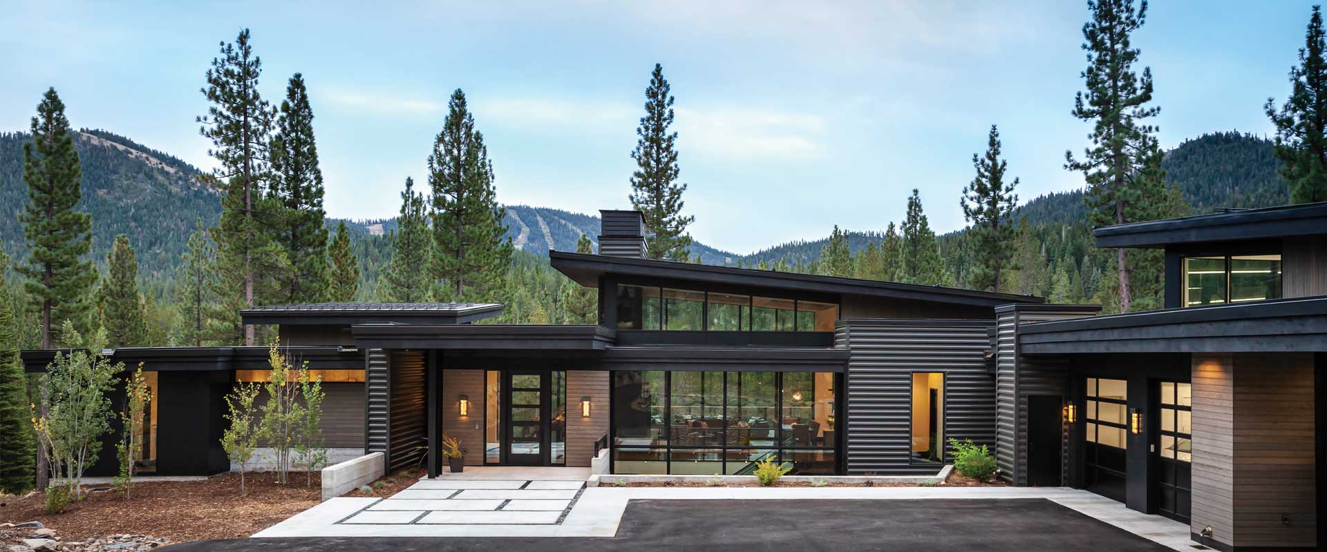 This stunning Mountain Modern home features expansive Kolbe Windows & Doors that not only frame the breathtaking views of the surrounding landscape but also provide a seamless connection between the indoors and outdoors. With its sleek design and cozy comforts, this modern mountain home is the perfect retreat for those looking to relax and unwind in style.