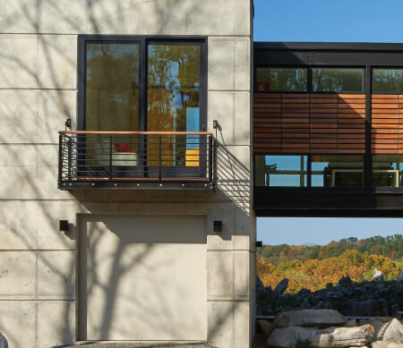 VistaLuxe sliding patio door with Coal Black exterior finish and Matte Black hardware.