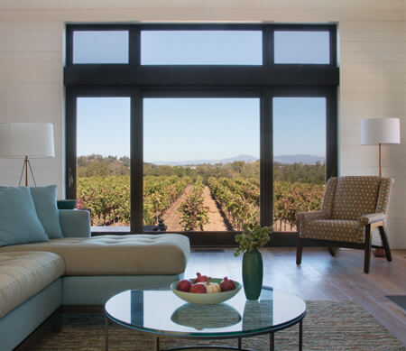 Ultra Series sliding patio door with wide stiles, Rustic Umber hardware and PDL bars.